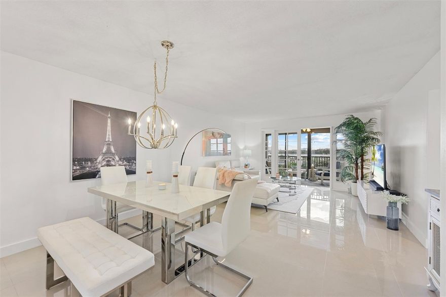 ABSOLUTELY STUNNING & FULLY REMODELED condo in Cypress Bend. This beautifully updated condo offers a bright, open-concept layout with sleek ceramic tile flooring throughout. The spacious kitchen features newer stainless steel appliances, custom cabinetry, and an open pass-through to the dining and living areas. Enjoy peace of mind with impact windows, new electrical panel and newer A/C and water heater making this home truly move in ready. Relax on your private balcony overlooking a tranquil canal. Community offers resort style amenities, many pools, tennis/pickleball courts, scenic walking trails, a clubhouse and more. Located just minutes from the nearly completed Pomp Plaza, featuring new restaurants and shopping, and right next to Harrah’s Casino/Top Golf this location is unbeatable!