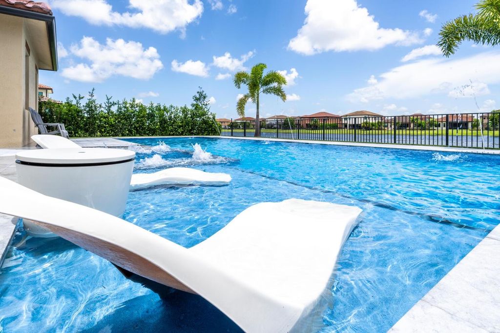 Photo of 12170 Lake Trail Lane, Parkland, FL 33076 (MLS # F10540797)