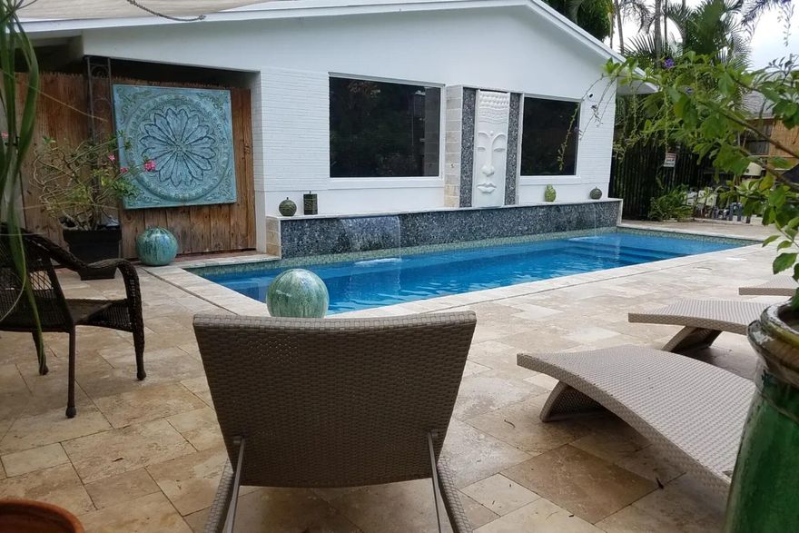 Introducing the Red Palm Villas, a fully operational quadplex offering exceptional income opportunities in the heart of Delray Beach. This turnkey property boasts four income-generating units, including three studios and a spacious two-bedroom, one-bathroom unit. Each unit features its own private patio space. The centerpiece of the Red Palm Villas is the Asian-inspired saltwater pool, offering a tranquil oasis for relaxation and rejuvenation. With a solid client base from VRBO and direct business bookings already in place, this property guarantees immediate income. And the potential for growth is tremendous. The Red Palm Villas are sold fully furnished and turnkey ensuring a smooth transition and eliminating any additional expenses. This is an incredible opportunity to step into a succ essful business and start generating returns right away. Whether you're an experienced investor or looking to venture into the rental market, the Red Palm Villas offers a compelling opportunity to capitalize on Delray Beach's thriving hospitality industry. Don't miss out on the chance to own a profitable quadplex with a stunning saltwater pool, close to downtown and brimming with income potential. Seize this opportunity and start reaping the rewards of the Red Palm Villas today.