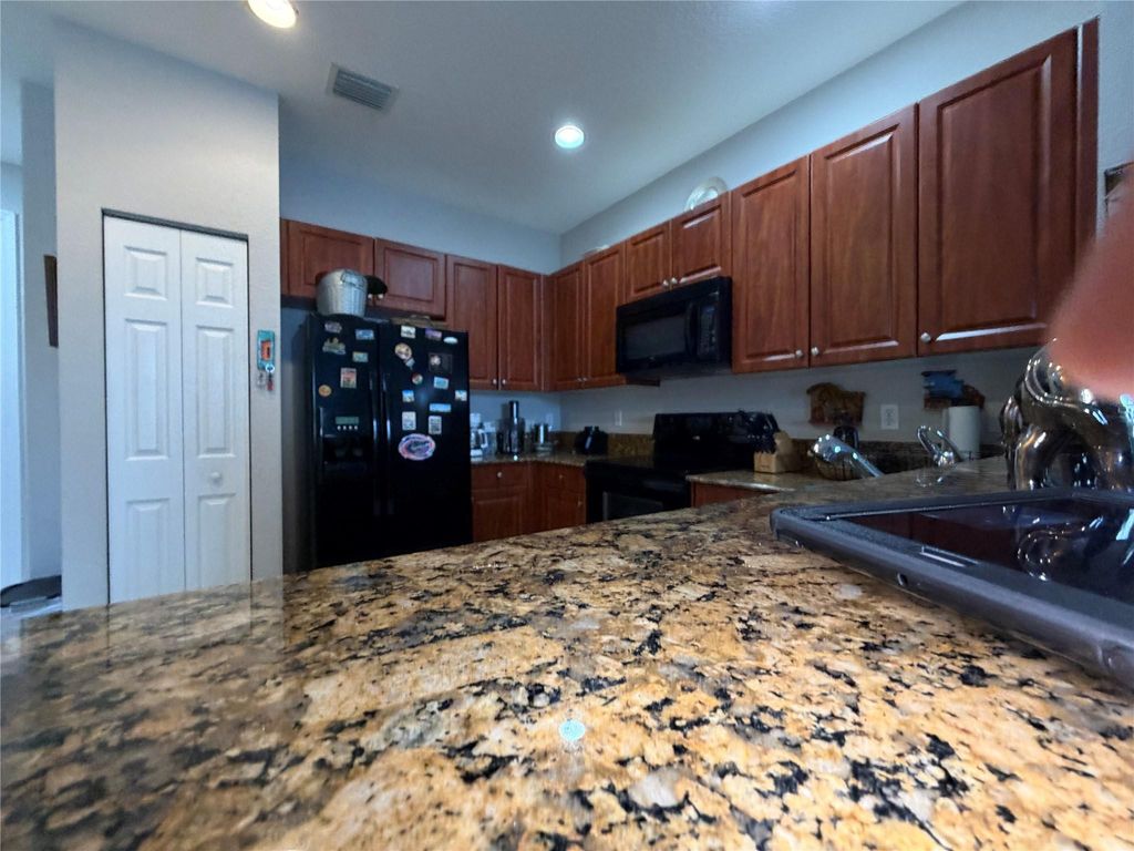 Photo of 1421 NW 34th Way #1421, Lauderhill, FL 33311 (MLS # F10549876)