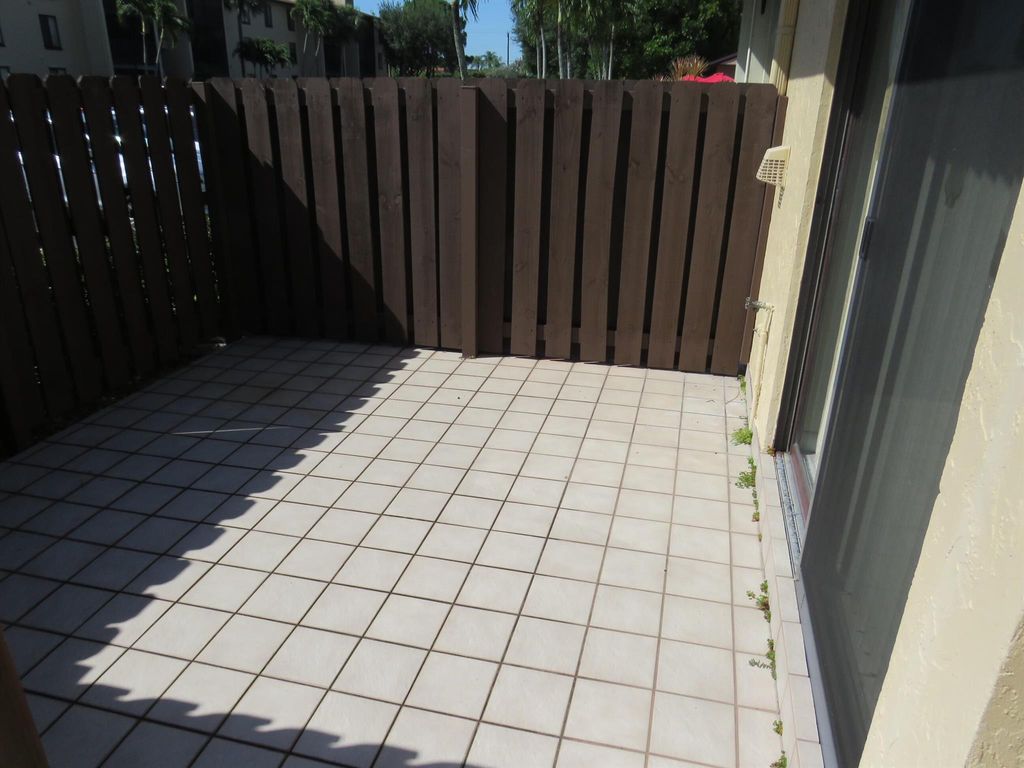 Photo of 816 Sky Pine Way #H, Greenacres, FL 33415 (MLS # R11091291)