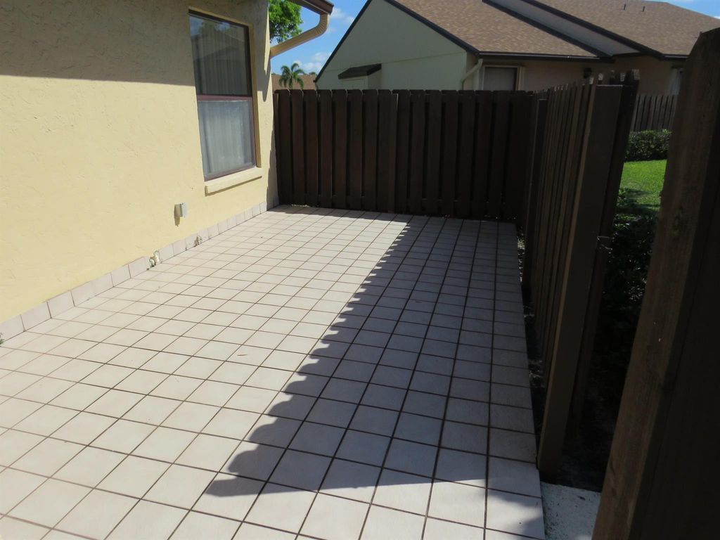 Photo of 816 Sky Pine Way #H, Greenacres, FL 33415 (MLS # R11091291)
