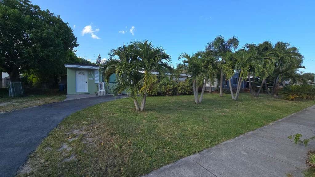 Photo of 911 NE 58TH Street, Oakland Park, FL 33334 (MLS # B26066530)