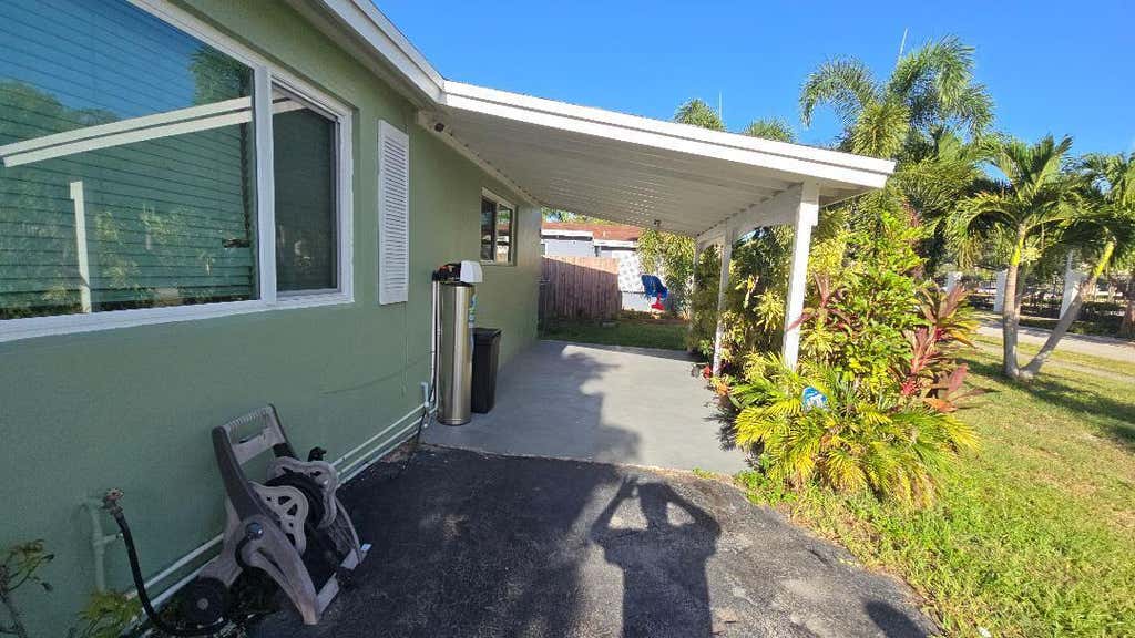 Photo of 911 NE 58TH Street, Oakland Park, FL 33334 (MLS # B26066530)