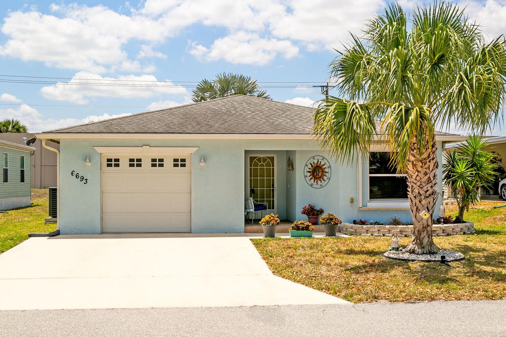 Photo of 6693 Dulce Real Real, Fort Pierce, FL 34951 (MLS # R10986655)