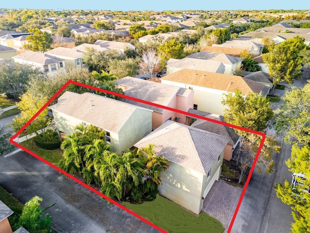 Photo of 2045 SE Avon Park Drive, Port Saint Lucie, FL 34952 (MLS # R11124983)