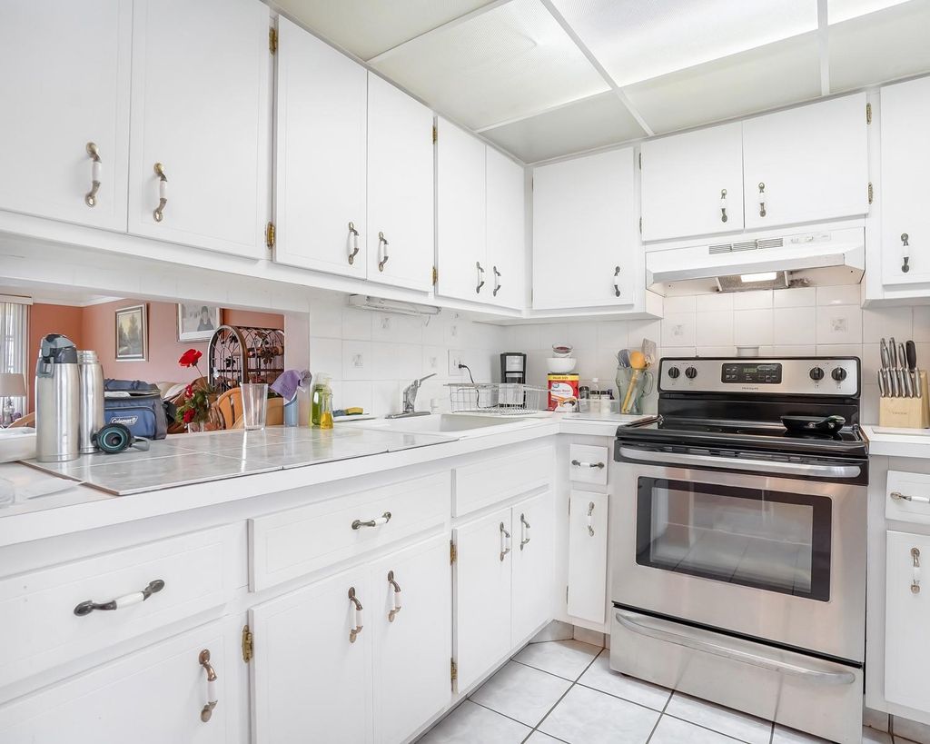 Photo of 2881 NW 47th Ter #406, Lauderdale Lakes, FL 33313 (MLS # F10540186)