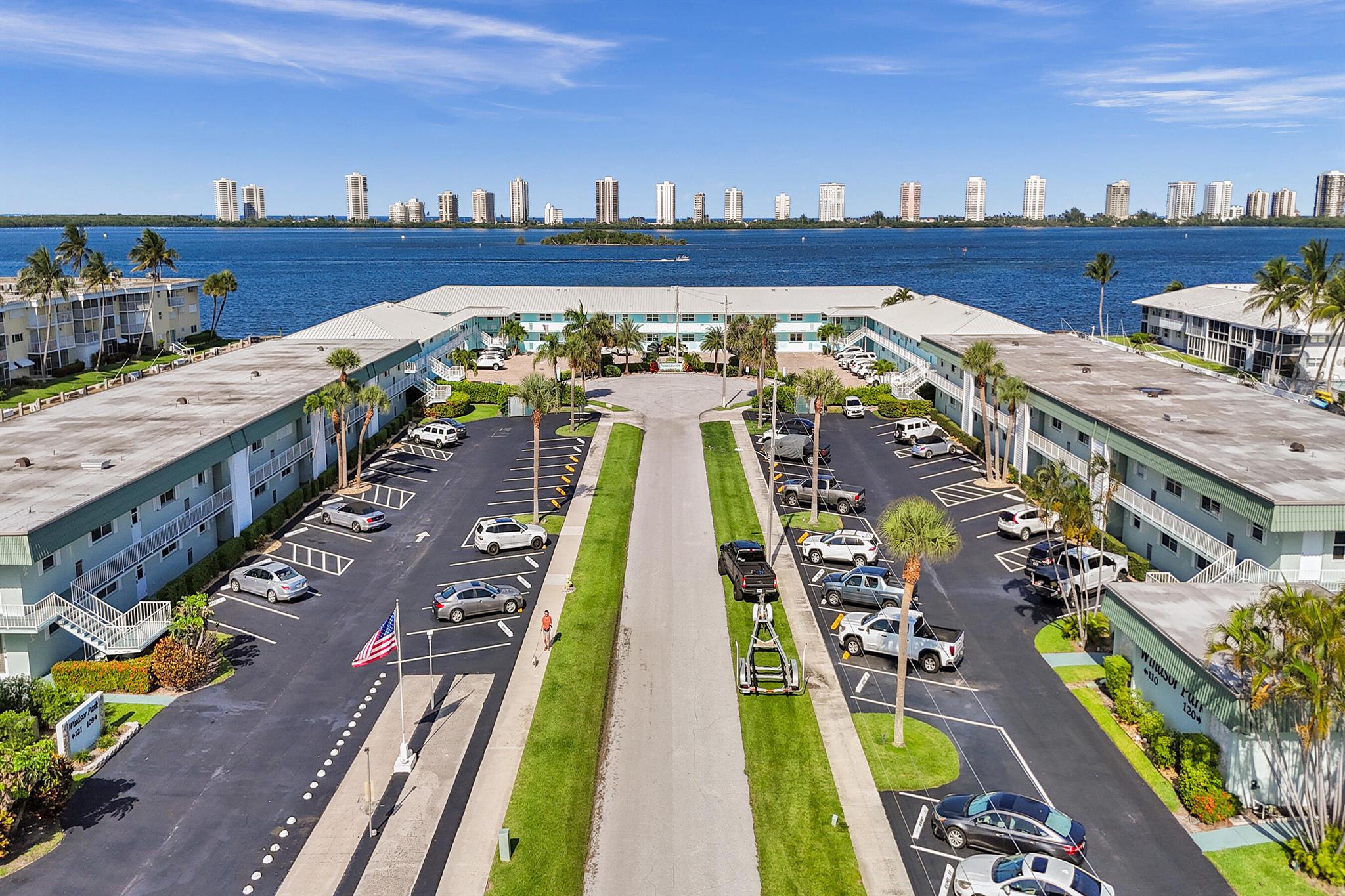 Waterfront Condo in NPB with unobstructed Water Views in this Intracoastal Waterfront Community!! Enjoy the balmy breezes & spectacular Sunrises and Moonrises! This Light & Bright condo has new light fixtures. AC replaced in 2024, tankless water heater 2023, new kitchen and master bath. Enjoy peaceful water views from your private & spacious screened-in balcony! Master suite has a large walk-in closet. This community boosts a 30' common dock. There is a required 2yrs ownership before renting. This is NOT a 55+ community! Minutes from, several great restaurants, The Gardens Mall, hospitals and PBI.