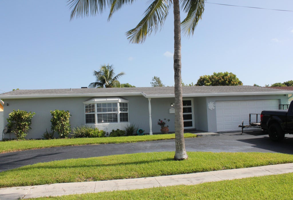Photo of 8571 NW 24th Court, Sunrise, FL 33322 (MLS # B26066165)