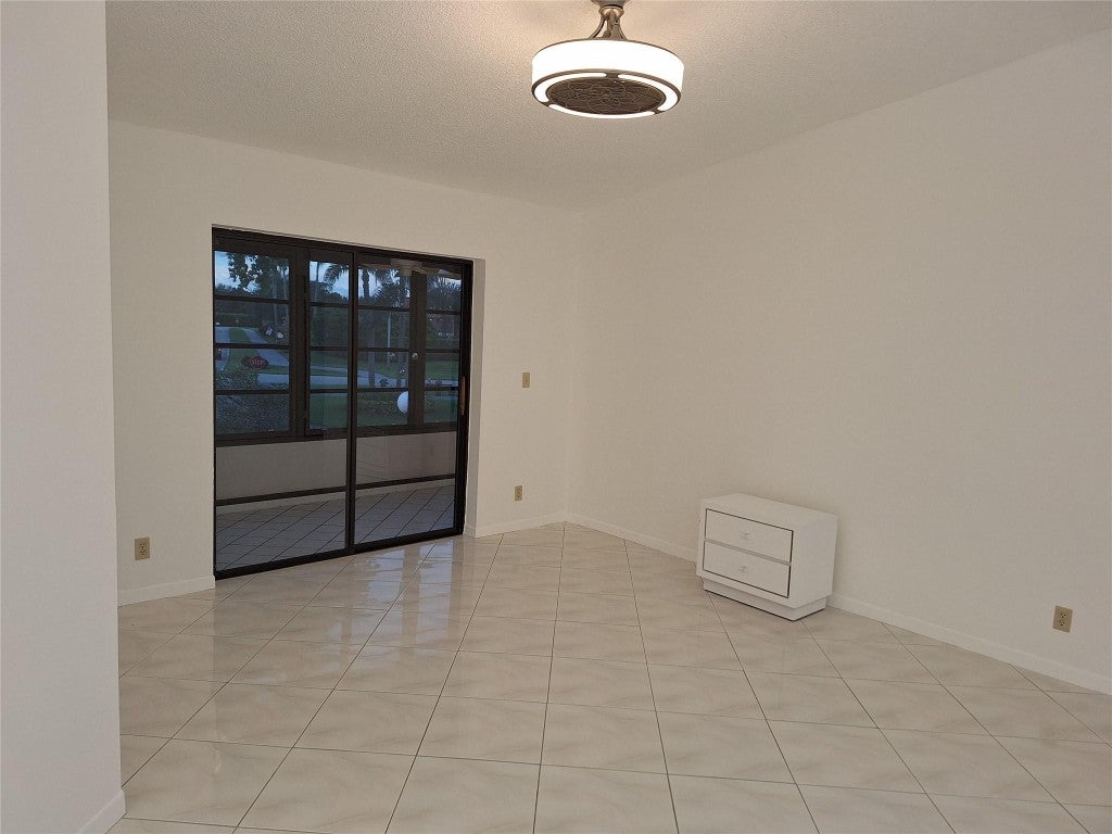 Photo of 15445 Lakes Of Delray Boulevard #205, Delray Beach, FL 33484 (MLS # F10401357)