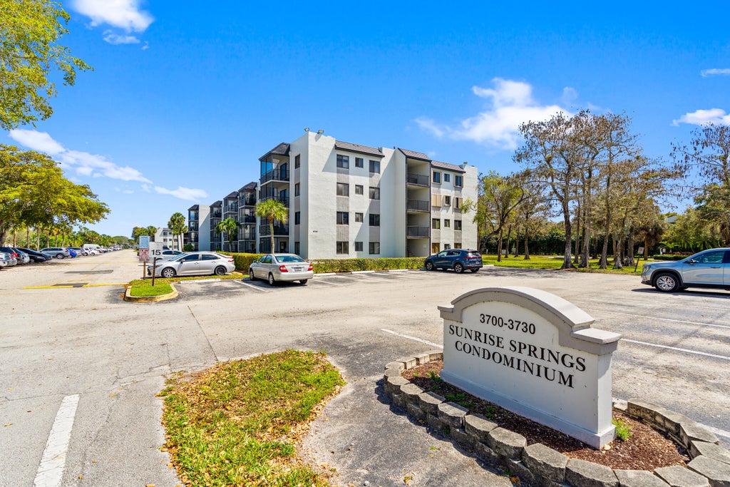 Photo of 3700 N PINE ISLAND Road #310, Sunrise, FL 33351 (MLS # B26079695)