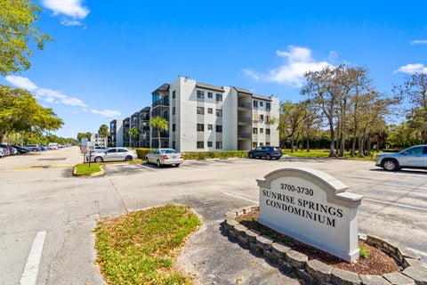 Photo of 3700 N PINE ISLAND Road #310, Sunrise, FL 33351 (MLS # B26079695)