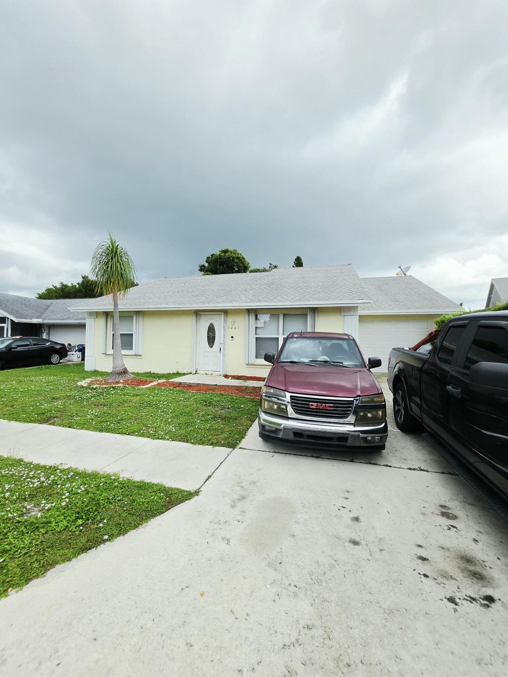 Photo of 5447 Twin Oakes Road, Greenacres, FL 33463 (MLS # B26048108)