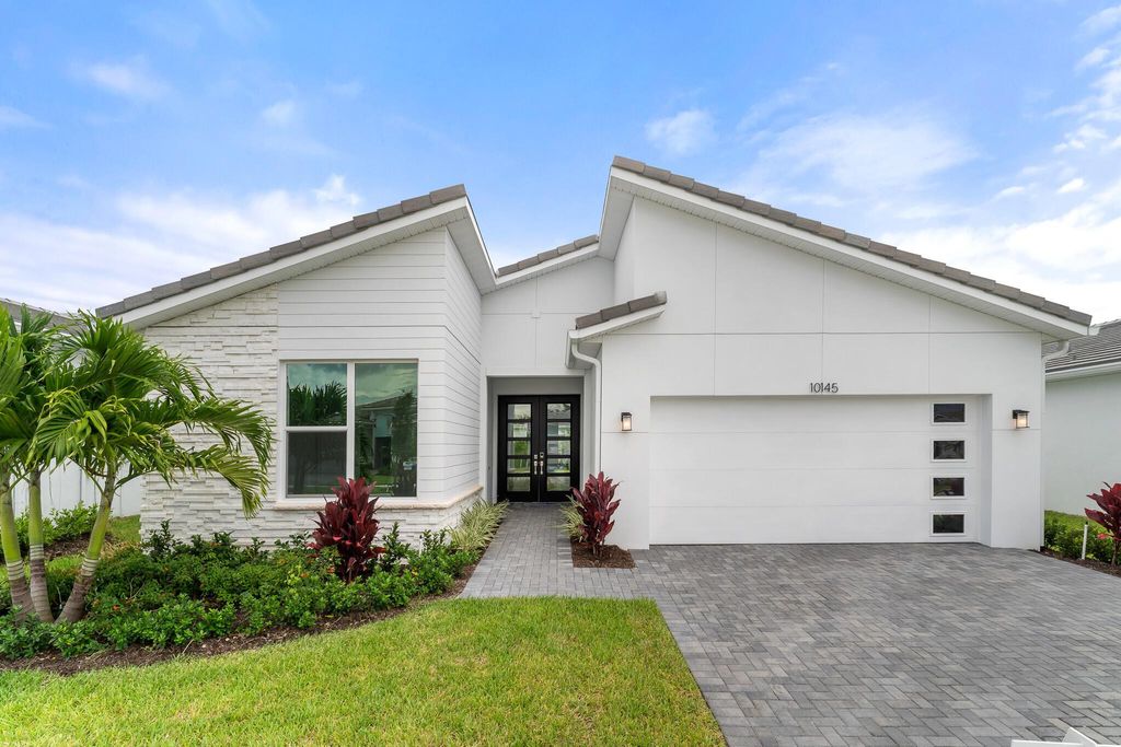 Photo of 10145 SW Carnelian Street, Port Saint Lucie, FL 34987 (MLS # R11109632)