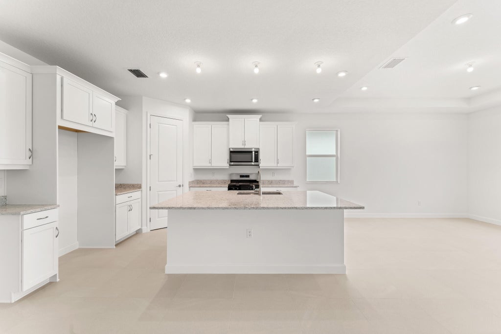 Photo of 10145 SW Carnelian Street, Port Saint Lucie, FL 34987 (MLS # R11109632)