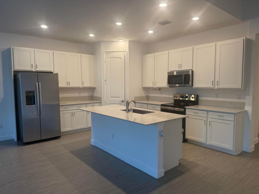 Photo of 4938 Navali Drive, Lake Worth, FL 33467 (MLS # B26008574)