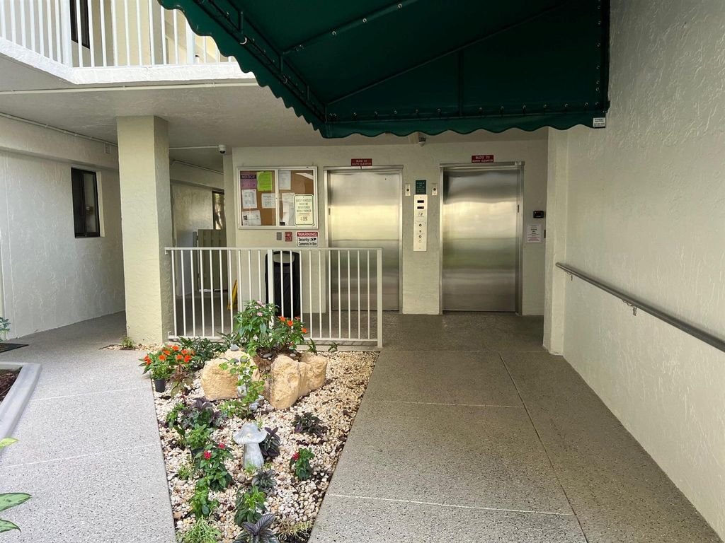 Photo of 2240 N Cypress Bend Drive #201, Pompano Beach, FL 33069 (MLS # R11016241)