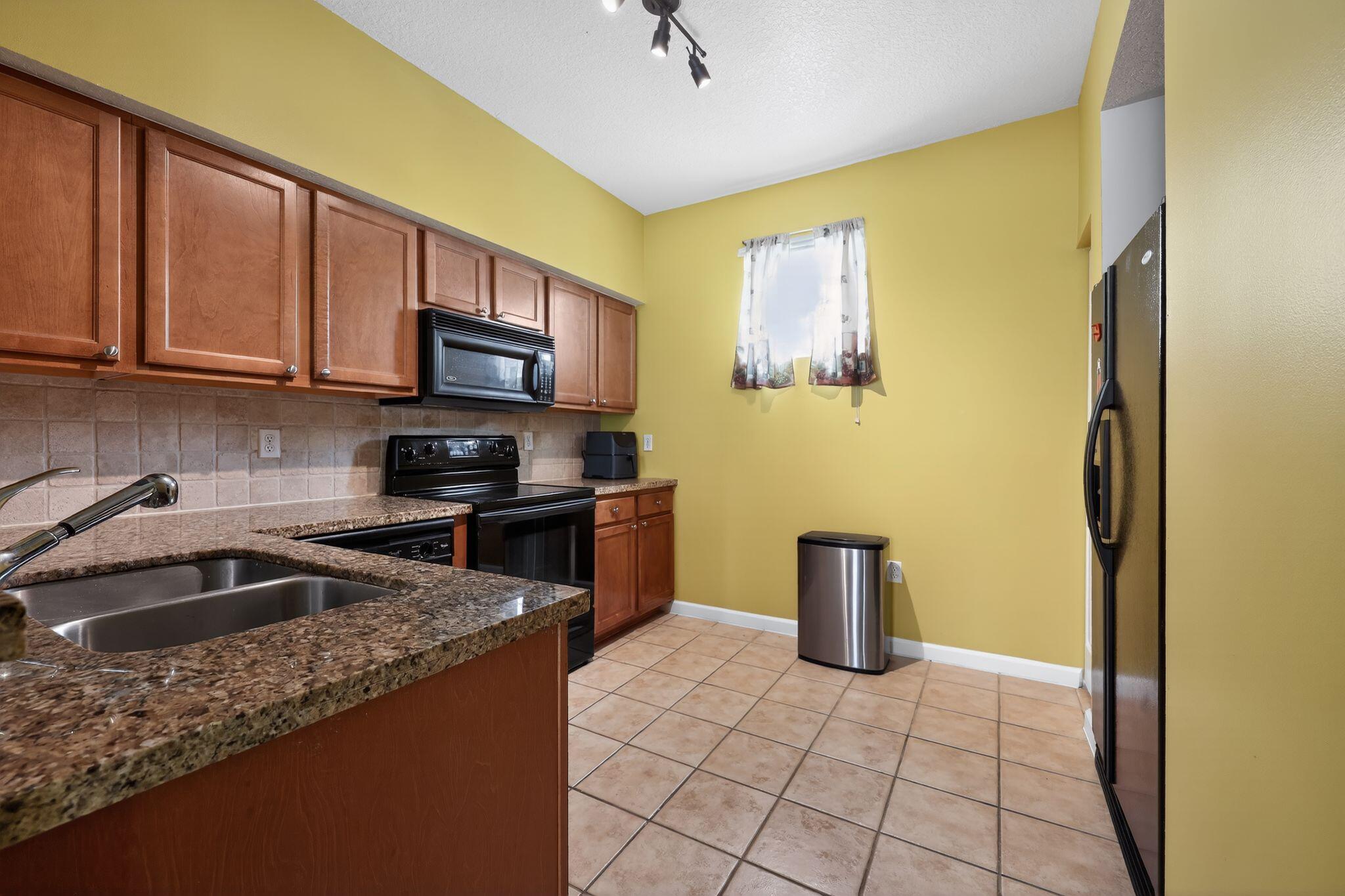 SOMERSET AT ABACOA CONDO - Residential