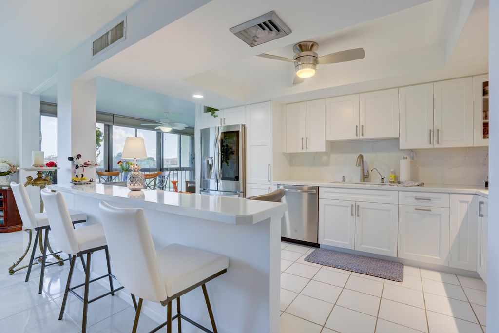 Photo of 5380 Woodland Lakes Drive #317, Palm Beach Gardens, FL 33418 (MLS # R10935752)