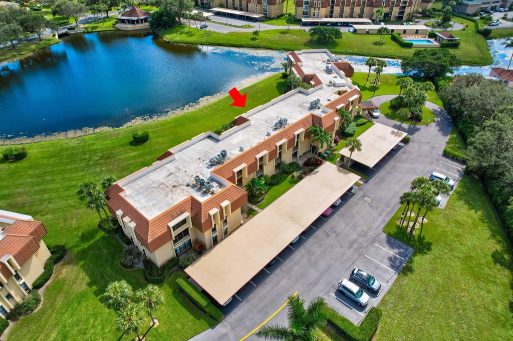 Photo of 5380 Woodland Lakes Drive #317, Palm Beach Gardens, FL 33418 (MLS # R10935752)