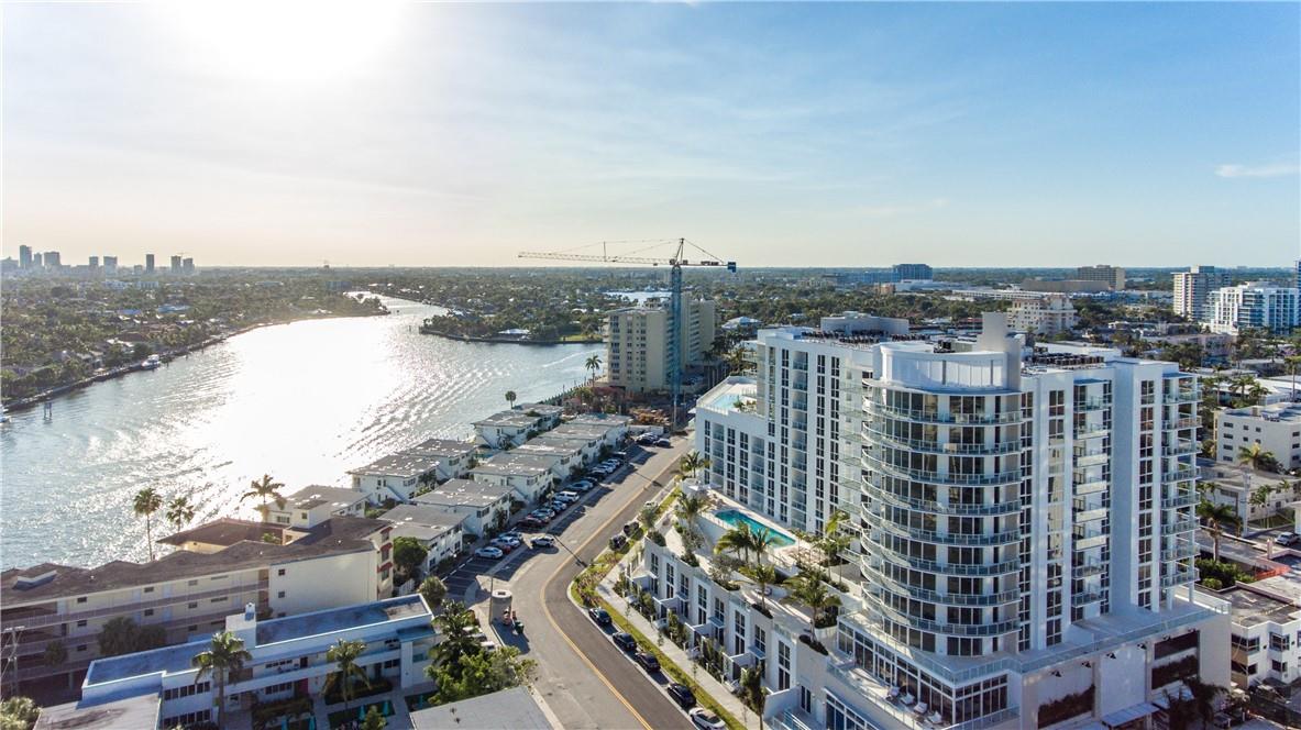 AVAILABLE NOW! The Beach Condo you have been waiting for! Steps to Fort Lauderdale Beach's white sands & the Intracoastal Waterway, minutes to Downtown, and a lifestyle on-property like no other! Tiffany House exudes the luxury and convenience that South Florida's dreams are made of. The magic begins upon arrival, with valet parking, a contemporary lobby, and amenities galore awaiting on the 3rd floor. Theater room, Fitness Center with Sauna, Club Room, & a billiard lounge. Plus, access to rooftop pools & a summer kitchen, too! Residence 1015 is the only unfurnished apartment available in the building. It features a corner 2 Beds & 2.5 Baths & a Den. Oversized Washer/Dryer. Be treated like family and enjoy resort-style comforts.