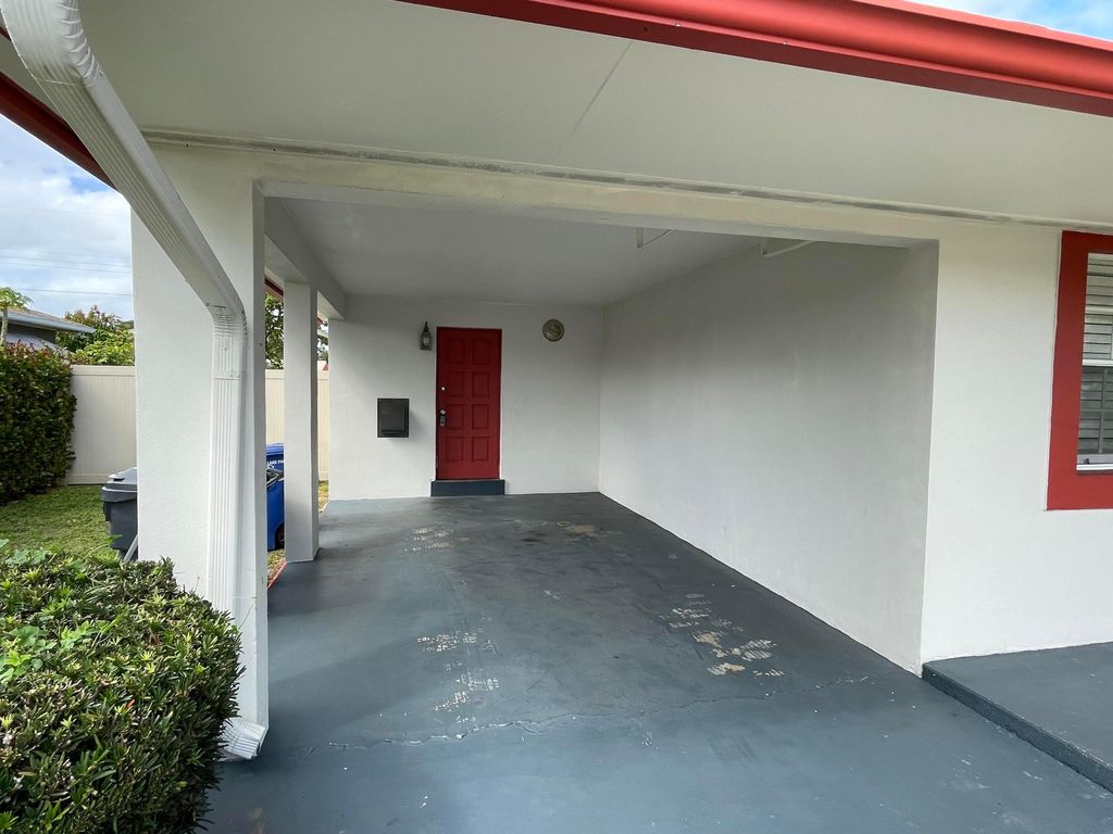 Photo of 427 Bayberry Drive, Lake Park, FL 33403 (MLS # R10956242)