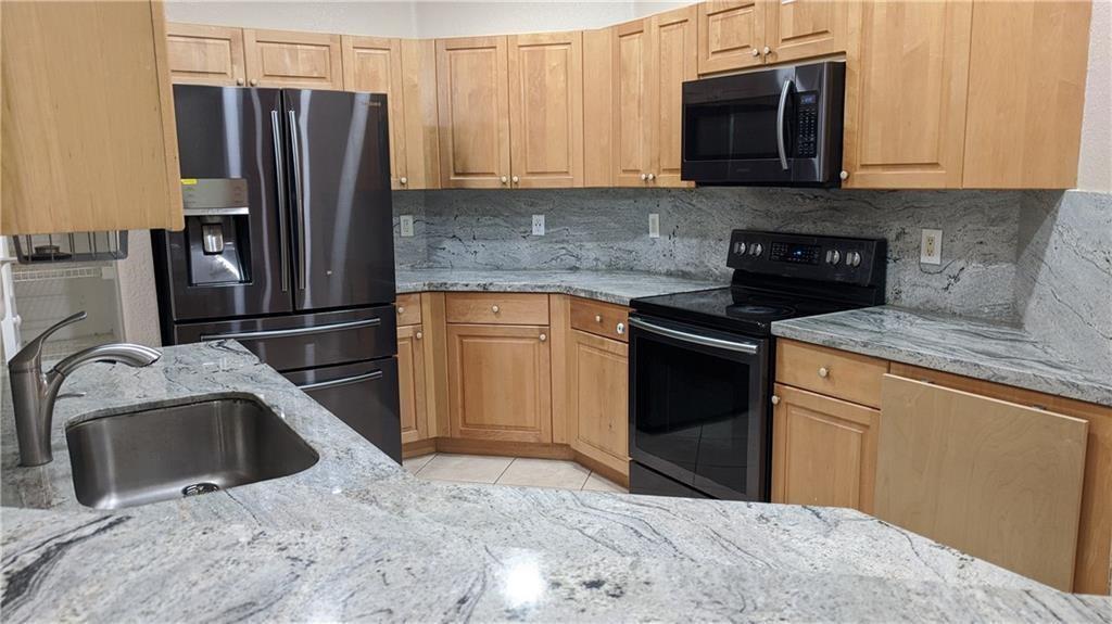 This beautifully updated 3-bed, 2-bath home in Weston’s sought-after Savanna community features a bright open layout filled with natural light, a new roof (2022), modern kitchen and baths, custom pantry, epoxy garage floor, and ample storage with custom cabinetry. AC, washer, and dryer are just 1 year old; appliances under 5 years old. Enjoy resort-style amenities including 2 pools, waterslide, kiddie pool, mini golf, walking trails, playgrounds, hockey, basketball, and on-site management. Zoned for top-rated “A” schools. Tenant pays utilities and lawn care. Available July 1, 2025.