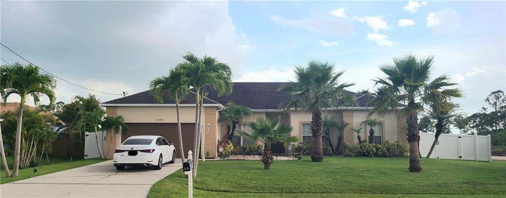 Photo of 2490 SW Webster Ln, Port Saint Lucie, FL 34953 (MLS # F10307300)