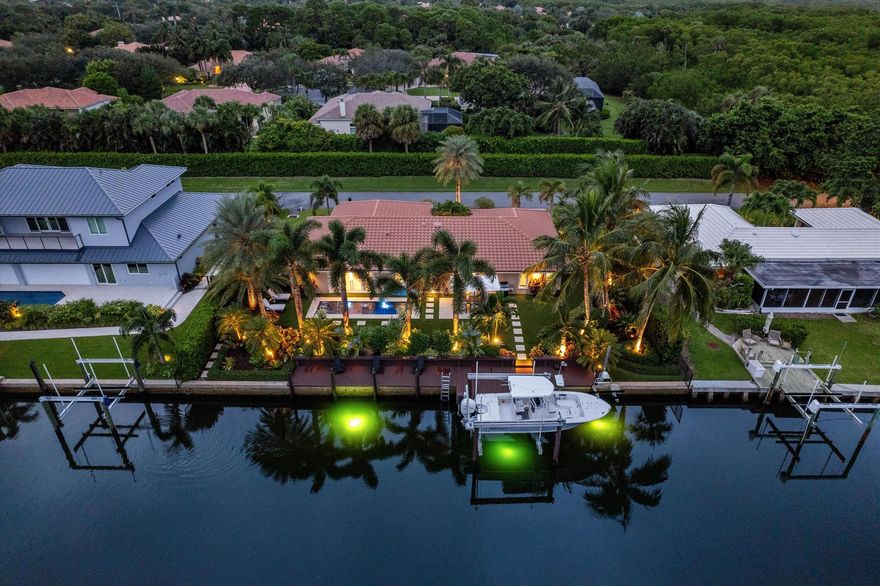 &#127796; Luxuriously Renovated Waterfront Pool Home in The Soundings, Hobe Sound, FL &#127796; Discover coastal living at its finest in this impeccably renovated 3-bedroom, 2-bath pool home with a 2-car garage, located in the highly sought-after Soundings neighborhood of Hobe Sound. This waterfront gem offers 110 feet of frontage and is a boater's paradise, featuring two boat lifts (24K)with electric and water hookups--all with no fixed bridges to the Intracoastal and ocean. &#127969; Interior Highlights: Gourmet kitchen with Cristallo quartzite countertops, top-of-the-line Wolf & Sub-Zero appliances, including a 48-inch 8-burner dual-fuel Wolf range (under warranty)Open-concept living space with 2x5 Limestone tile throughout, Fully furnished with a few exclusions--move in