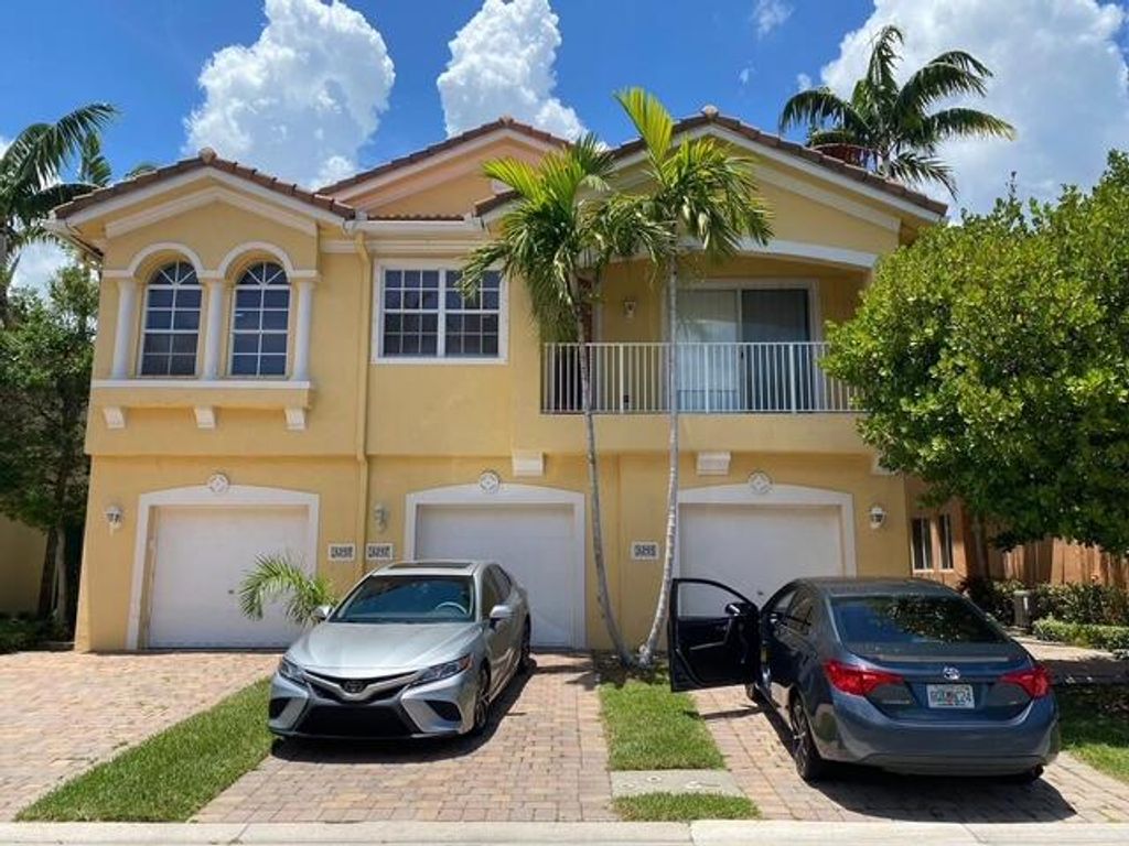Photo of 3255 Scarletta Drive, Riviera Beach, FL 33404 (MLS # R11131722)