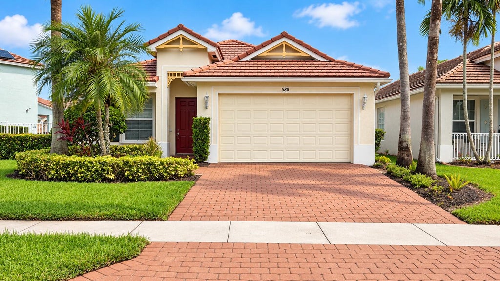 Photo of 588 BELLE GROVE Lane, West Palm Beach, FL 33411 (MLS # B26083714)