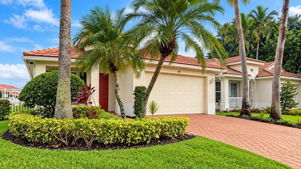 Photo of 588 BELLE GROVE Lane, West Palm Beach, FL 33411 (MLS # B26083714)