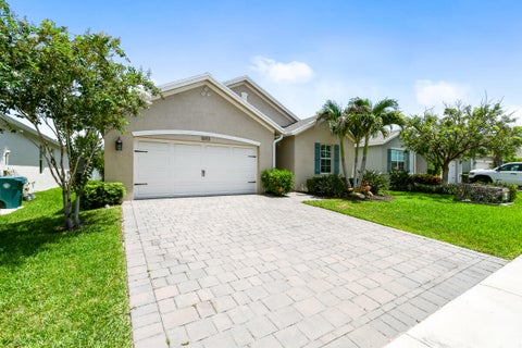 Photo of 1693 NE White Pine Terrace, Jensen Beach, FL 34957 (MLS # B26054463)