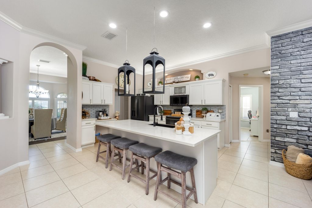 Photo of 1565 SW Santander Avenue, Port Saint Lucie, FL 34953 (MLS # R10943776)