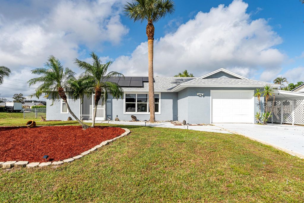 Photo of 2312 SE Shipping Road, Port Saint Lucie, FL 34952 (MLS # R11061452)
