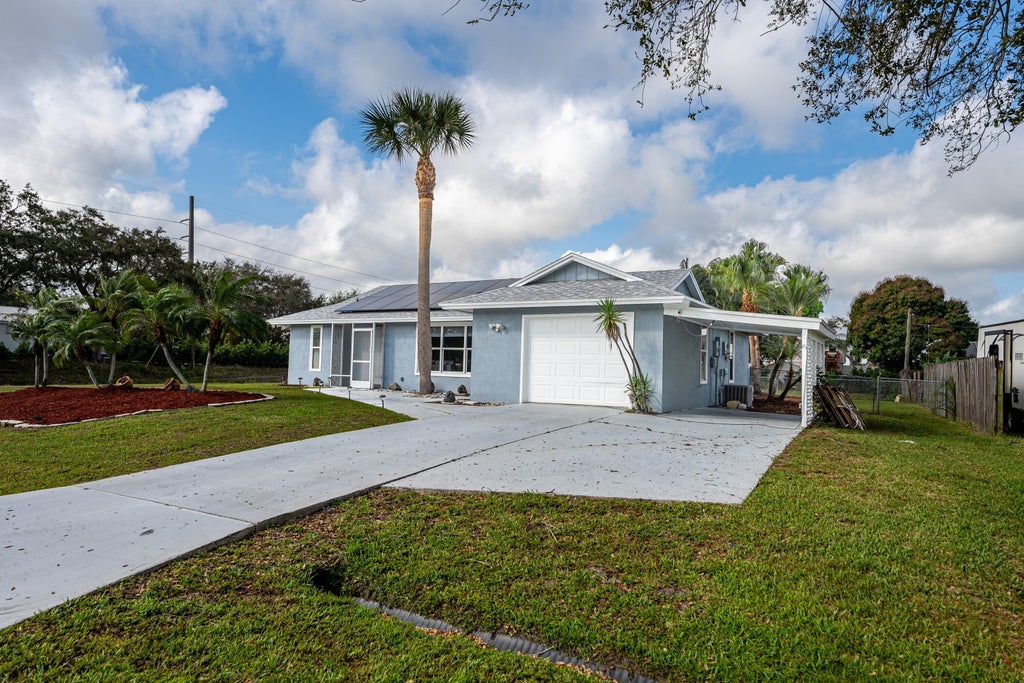 Photo of 2312 SE Shipping Road, Port Saint Lucie, FL 34952 (MLS # R11061452)