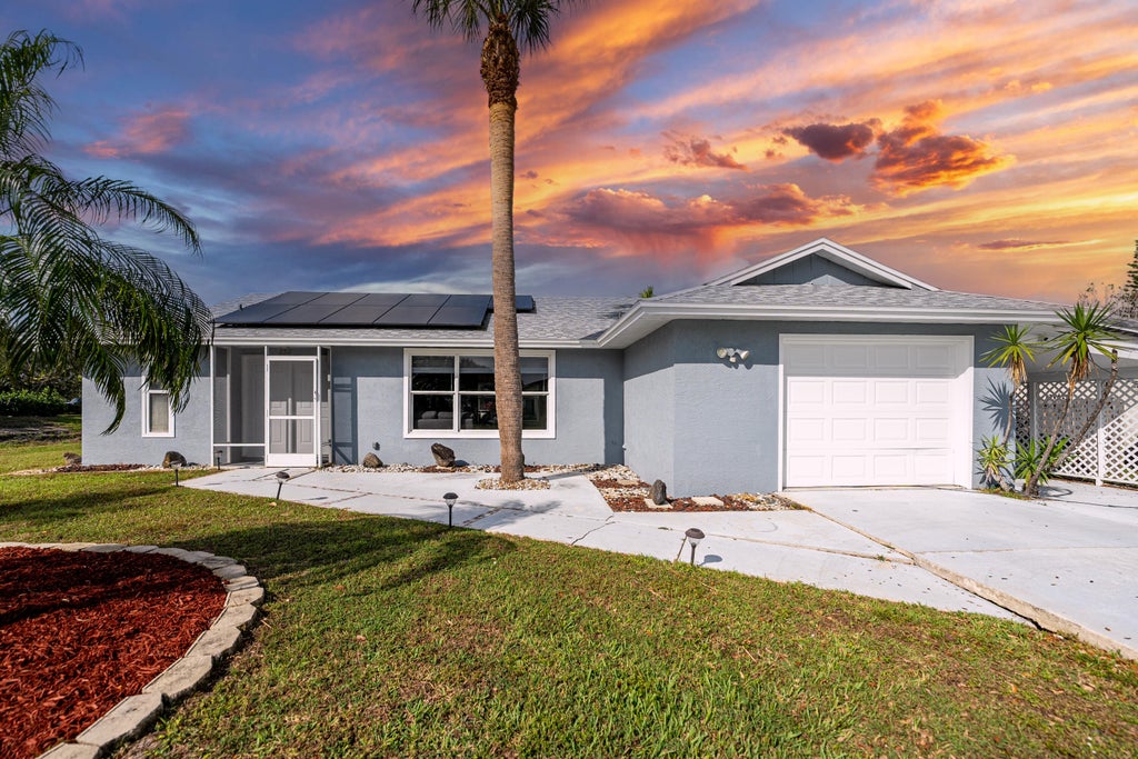 Photo of 2312 SE Shipping Road, Port Saint Lucie, FL 34952 (MLS # R11061452)