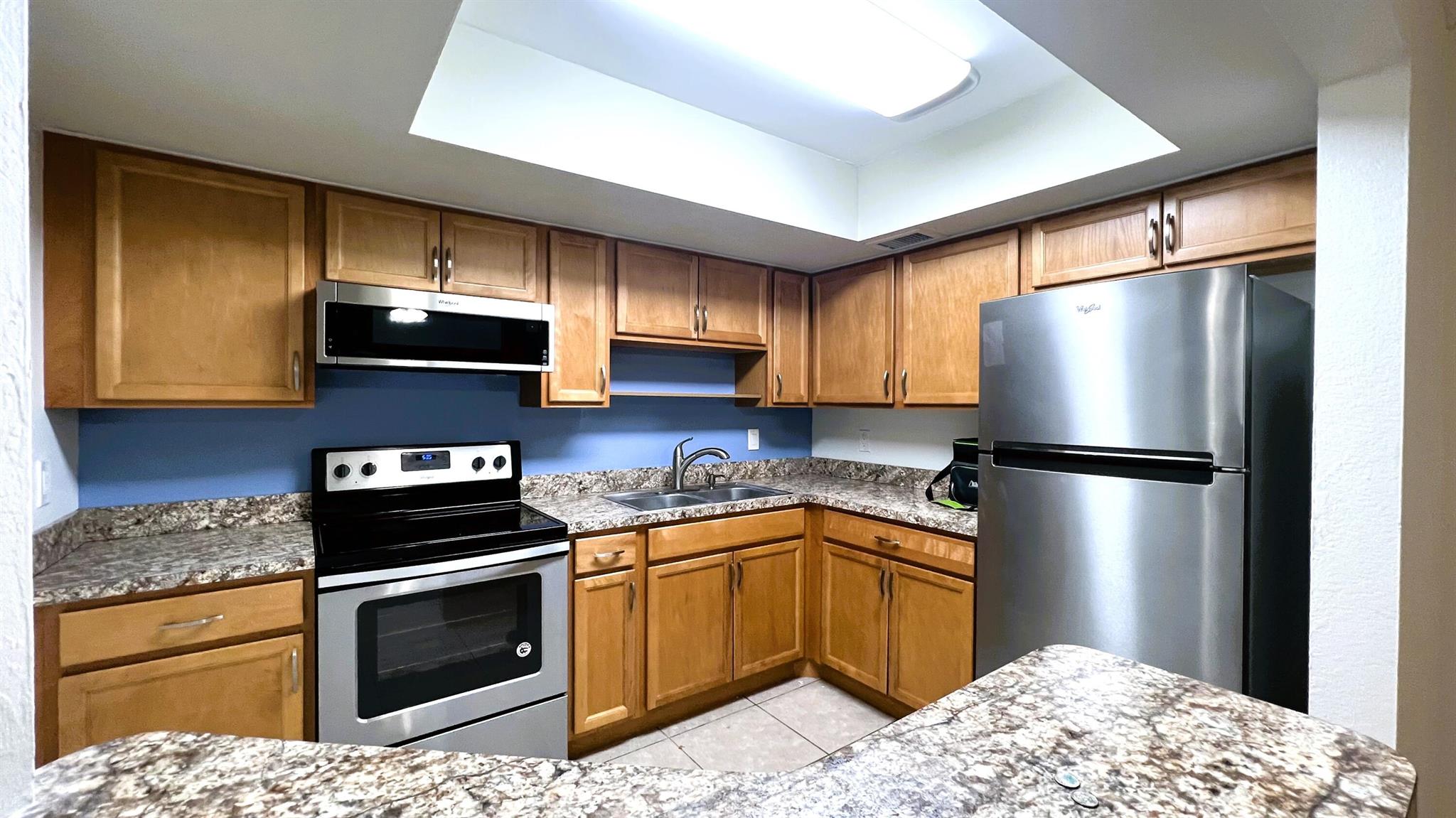 This 3/2 move in ready, 2nd floor tastefully updated unit features: Upgraded wood kitchen cabinetry w/ plenty of storage, all newer whirlpool stainless appliances & snack bar. >the laminate & tile floor (no carpet) + neutral colors + all new installed led lights create an enjoyable atmosphere. It also has a spacious living area, washer & dryer inside, updated guest & master bathroom with new plumbing fixtures, huge master bedroom with lots of closet's space, the slider leads you to a screened balcony with relaxing view. Plenty of natural light, all ac vents have been just cleaned, one assigned parking but plenty extra parking spaces, not to mention the serene community with clubhouse & large pool. In addition, minutes to the beaches, restaurants, shopping centers, and major highways !!