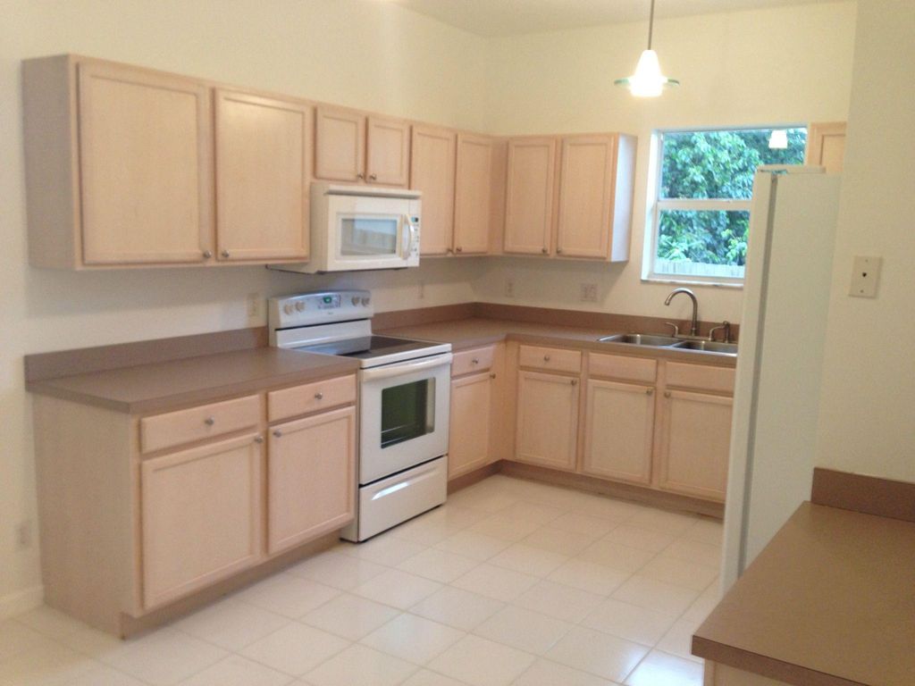 Photo of 1731 Lavue Avenue, Lake Worth Beach, FL 33460 (MLS # B26016340)