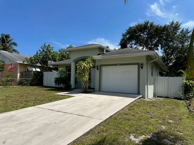 Photo of 1731 Lavue Avenue, Lake Worth Beach, FL 33460 (MLS # B26016340)