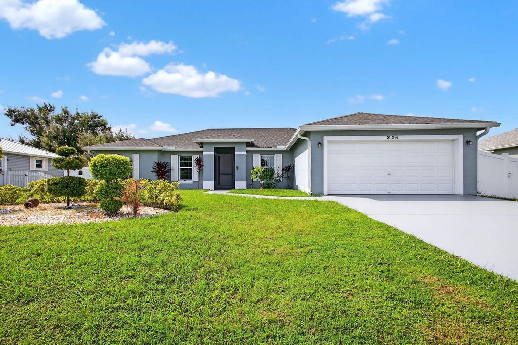 Photo of 226 SW Starfish Avenue, Port Saint Lucie, FL 34984 (MLS # R11109722)