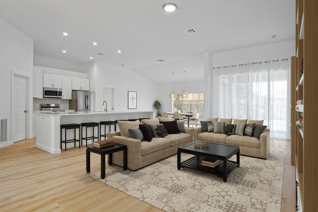 Photo of 565 SW Halkell Avenue, Port Saint Lucie, FL 34953 (MLS # R11068682)