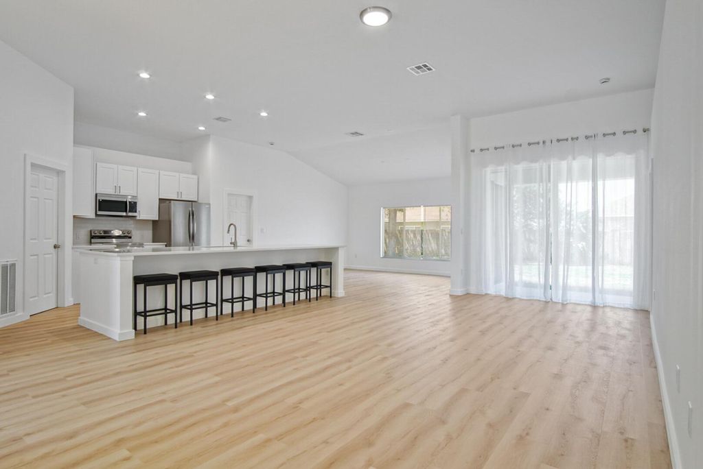 Photo of 565 SW Halkell Avenue, Port Saint Lucie, FL 34953 (MLS # R11068682)