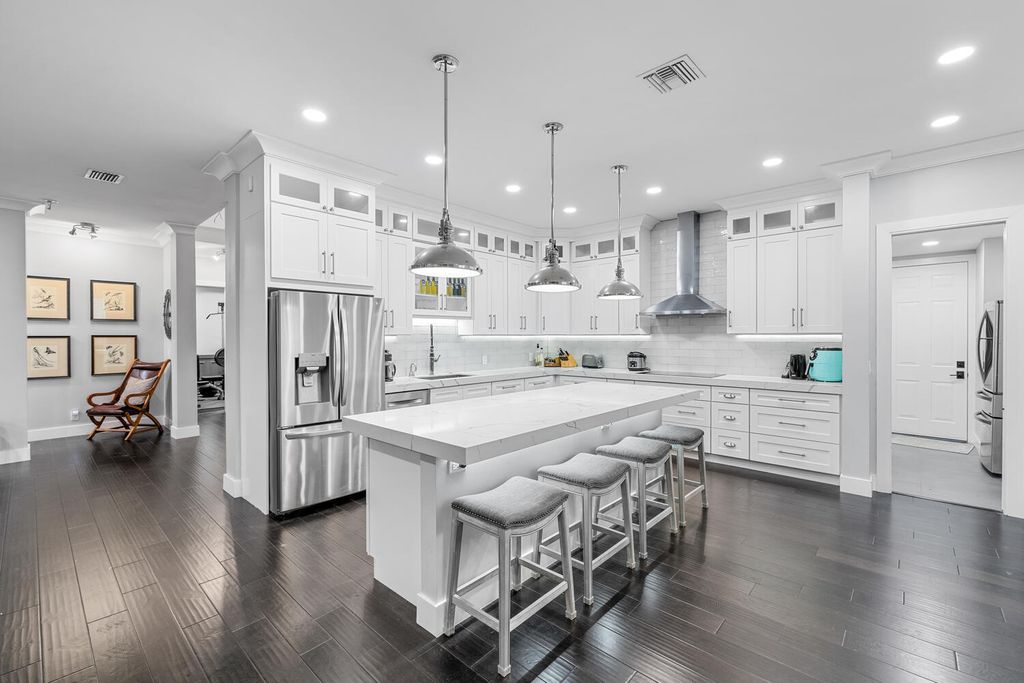Photo of 9241 Madewood Court, West Palm Beach, FL 33411 (MLS # B26024610)