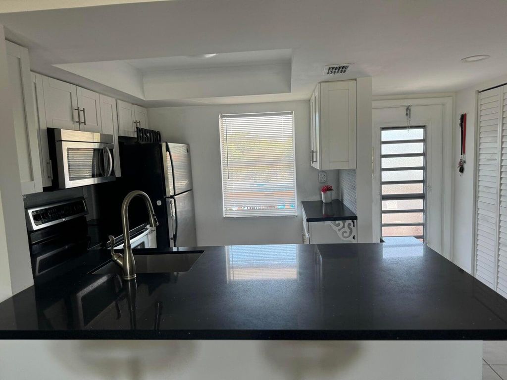 Photo of 9272 SW 3rd Street #411, Boca Raton, FL 33428 (MLS # R11133621)