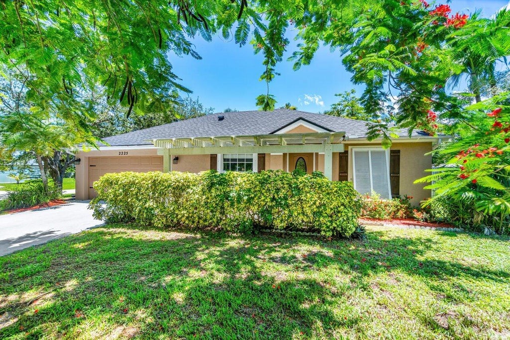Photo of 2225 SW Trapp Terrace, Port Saint Lucie, FL 34953 (MLS # R11001470)