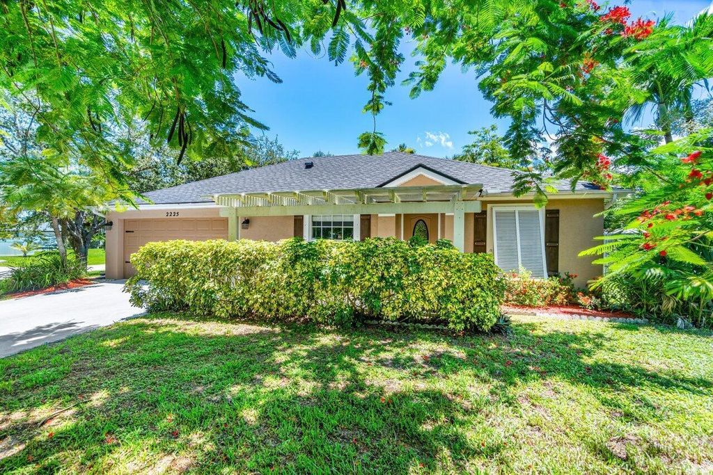 Photo of 2225 SW Trapp Terrace, Port Saint Lucie, FL 34953 (MLS # R11001470)