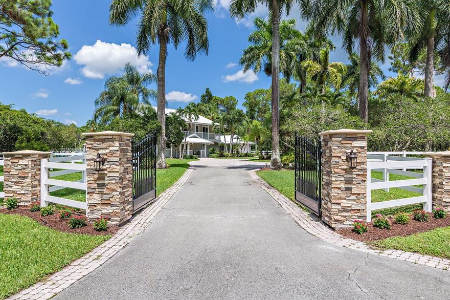 All sizes approx. Style and sophistication meet county charm in this amazing 5-bedroom, 6-bathroom, 5-acre estate type property.  Driving through the beautiful wrought iron style gates brings you to a decorative circular paver driveway and a Key West style home in a park like setting.  An abundance of soring trees and beautiful plants are married throughout this well-manicured perfectly proportioned, truly usable 5-acre property.   However, it is not until you enter this house that you will be completely amazed by its elegance, comfort and upgrades galore.   Please read the supplement for details on this home.  More