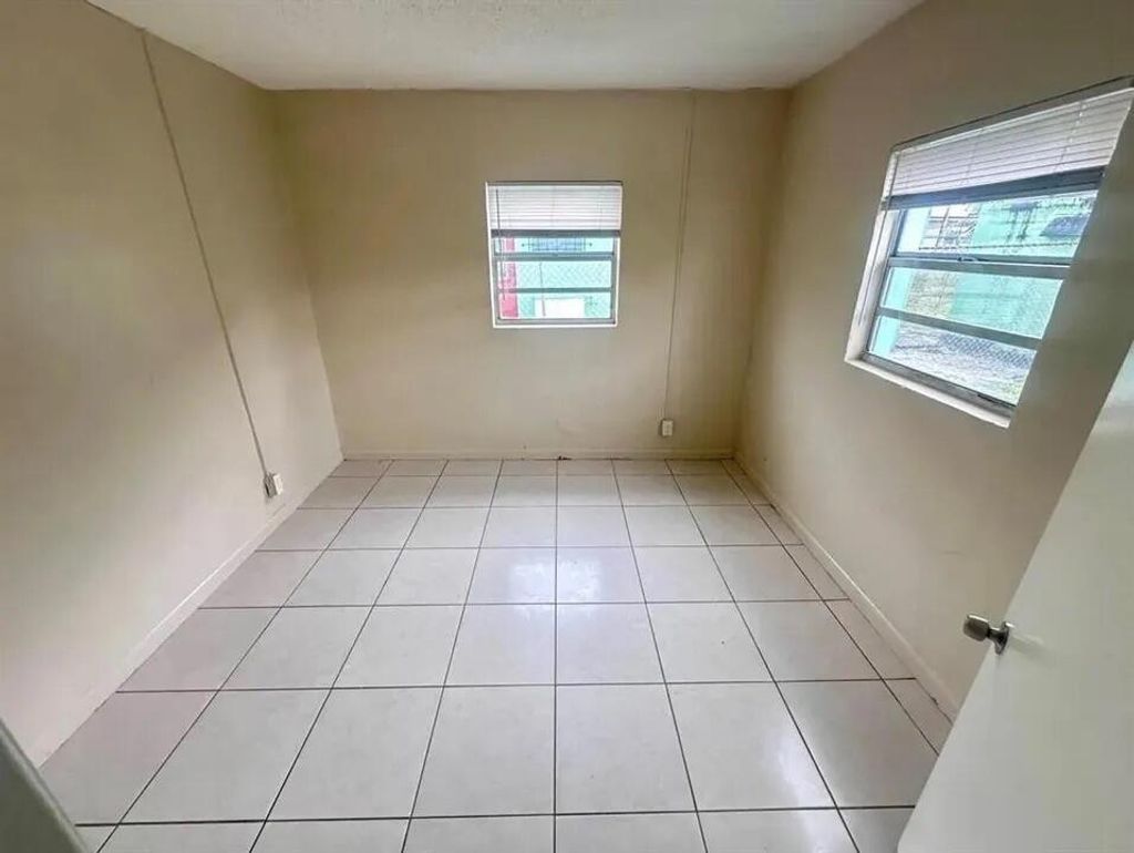 Photo of 633 NW 15th Terrace #1, Fort Lauderdale, FL 33311 (MLS # B26038983)
