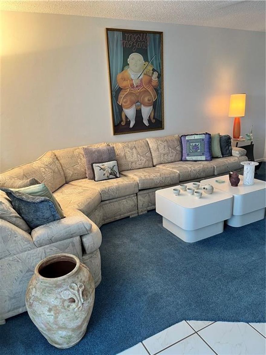 Location..Location..This 2 br 2 Full Bath..with EnSuite.. Ready for your occupancy.. Remodeled kitchen and Bathrooms..Oversized screened Florida Room..Roll Down Shutters.. Relaxing water view...Country Club Living on a Budget..55+ CommunityMaintenance:  Master Mgmt $122., CenClub $108, Seacrest Services $240